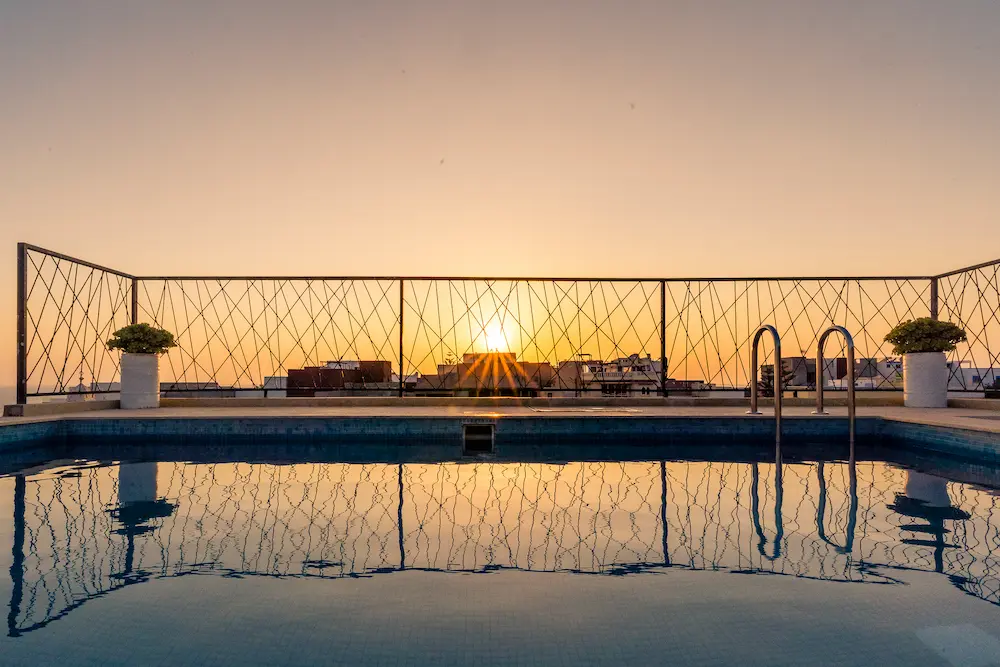 Rooftop Pool at Sunset - Hotel Taghazout at The Yogi Surfer in Taghazout Bay, Morocco.