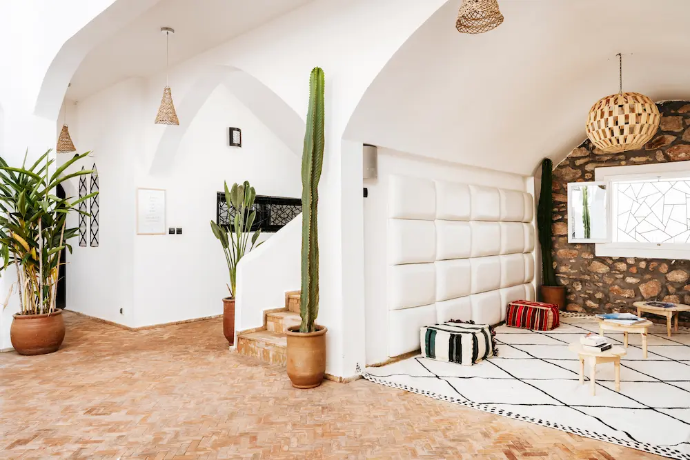 Moroccan Villa Terrace Lounge with Cactus at The Yogi Surfer in Taghazout Bay, Morocco.