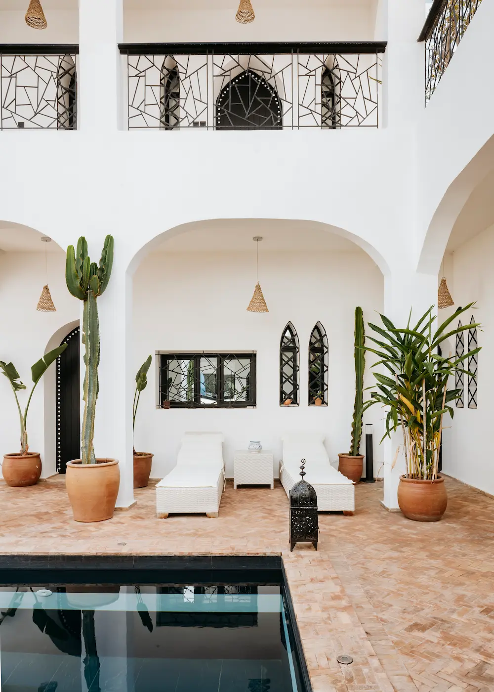 Villa Courtyard Pool Terrace with Loungers at The Yogi Surfer in Taghazout Bay, Morocco.
