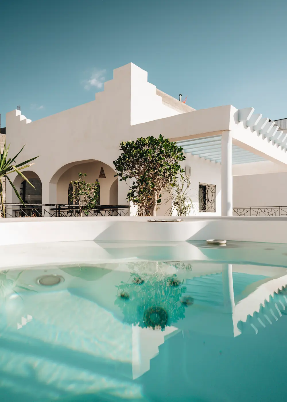 White Villa Terrace Jacuzzi Reflection at The Yogi Surfer in Taghazout Bay, Morocco.